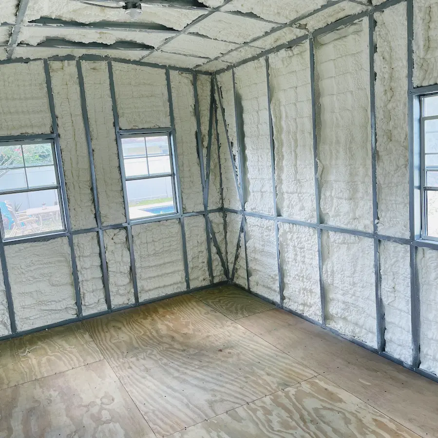Closed-cell spray foam insulation applied to wall cavities in a residential project in Stowe